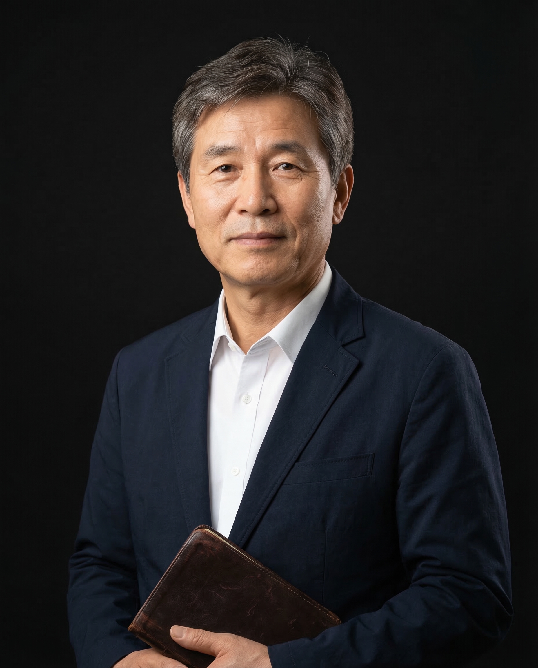 Portrait holding a Bible